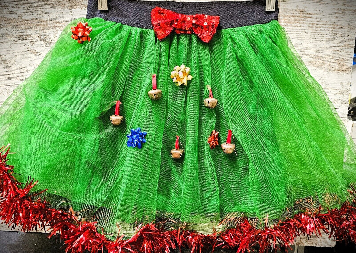 GREEN TINSEL TUTU WITH BOWS & BELLS - ONE SIZE FITS MOST