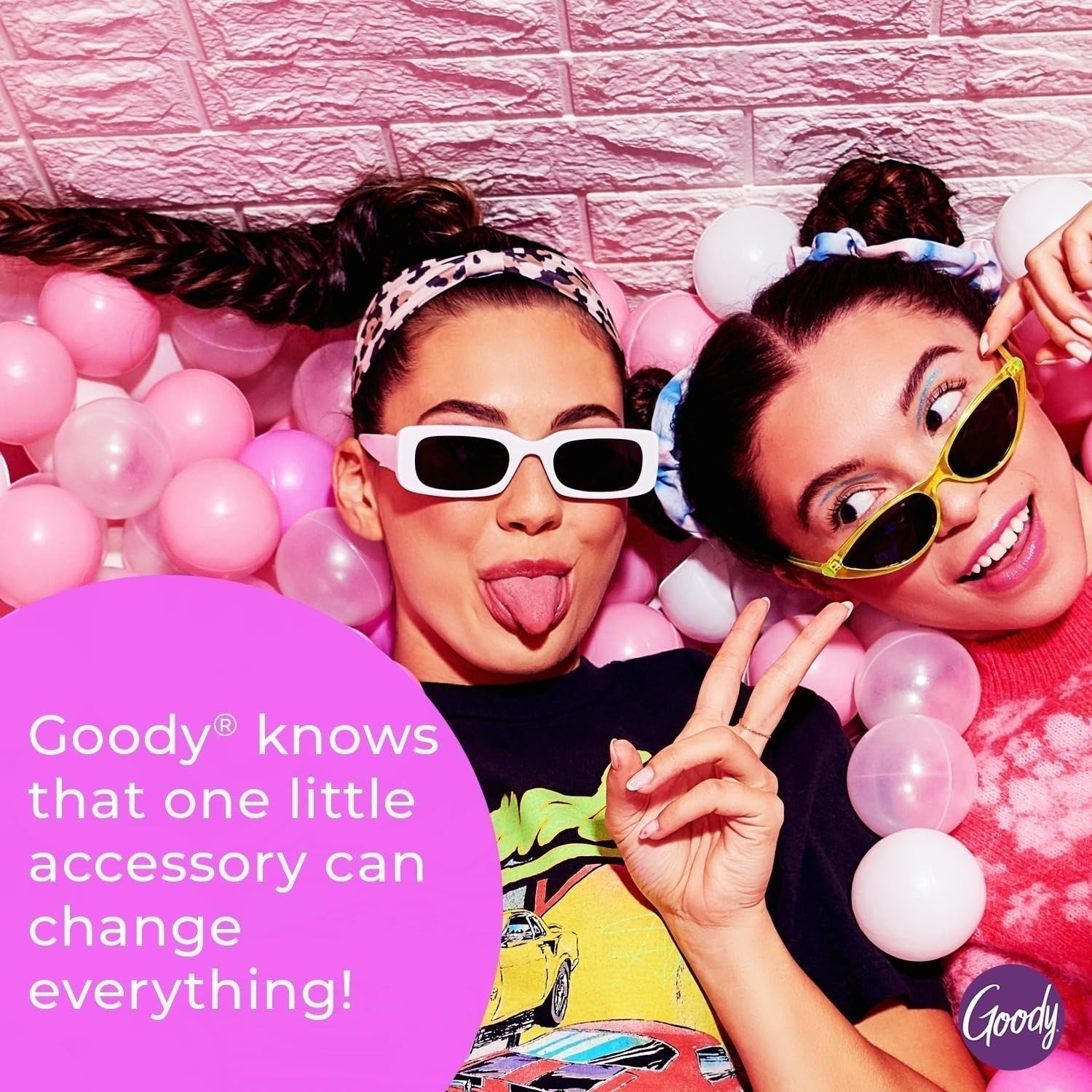 The Wholesale Outlet Goody wavy headbands worn by two women in a pink ball pit with sunglasses and playful poses.