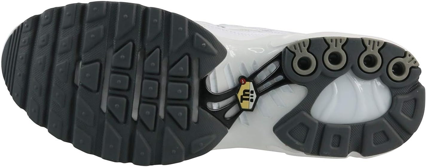 The Wholesale Outlet Nike Air Max Plus sneaker outsole in white, black, and cool grey with signature TN branding.