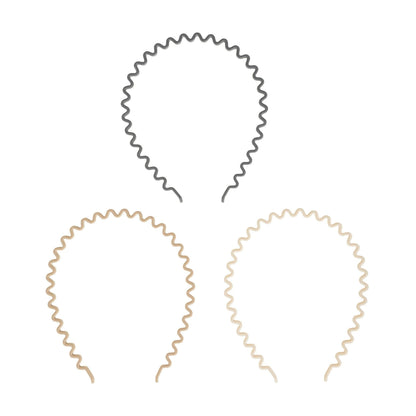 The Wholesale Outlet Goody wavy hair headband set in black, beige, and light brown for a secure, comfortable fit.
